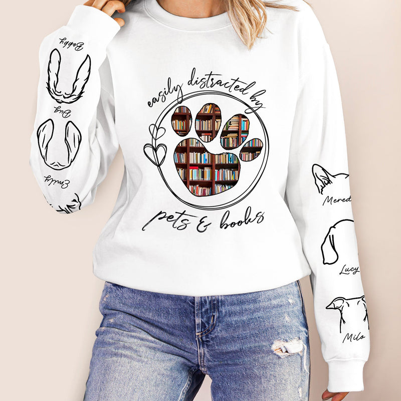 Easily Distracted By Dogs Cats And Books - Birthday, Loving Gift For Dog Lover, Cat Mom, Pet Mum - Personalized Unisex Sweatshirt With Design On Sleeve